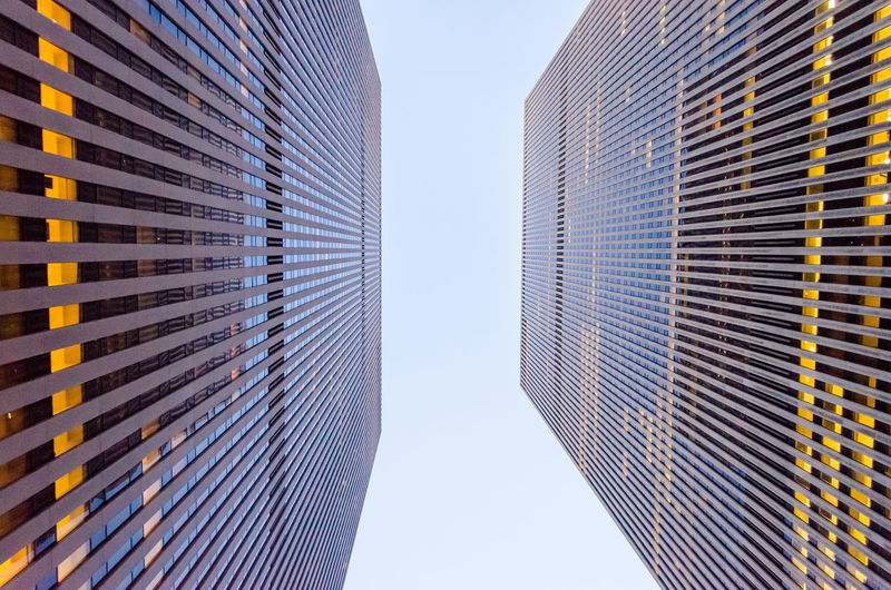 Low angle view of modern buildings against sky