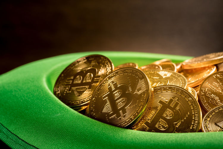 Close-up of coins in hat