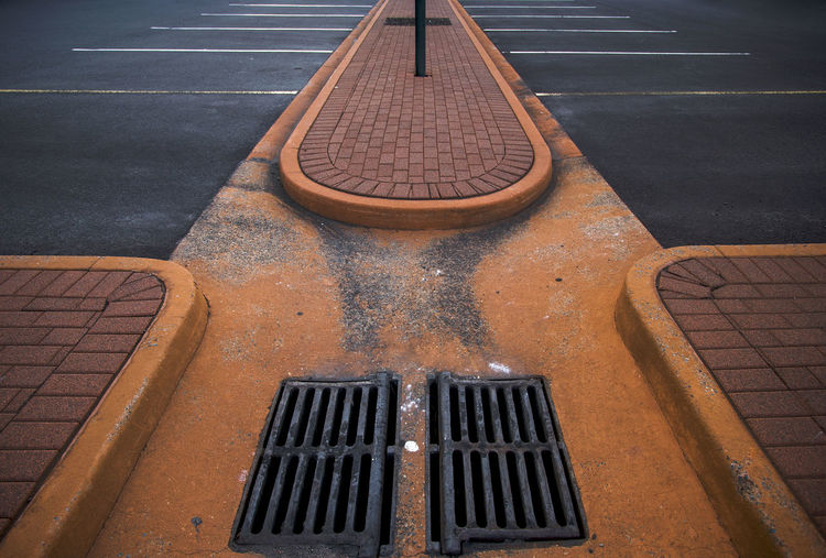 High angle view of manhole on road
