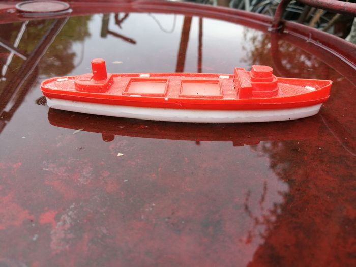 Close up of red boat