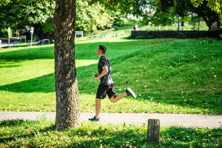 Full length of man running in park