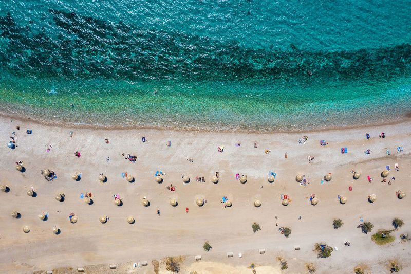 High angle view of group of people on beach