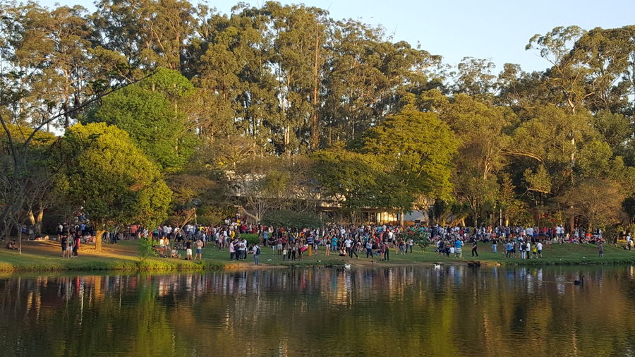 People enjoying in park during autumn