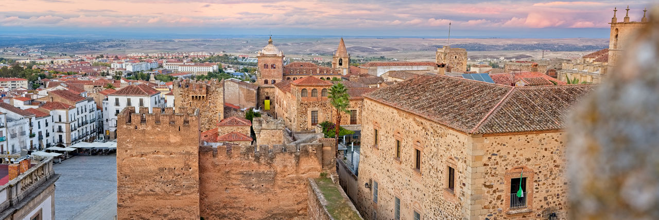 Panoramic view of the historic center of cáceres at sunset