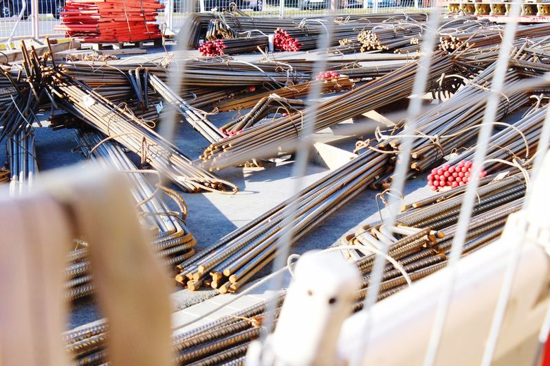 High angle view of iron rods at construction site