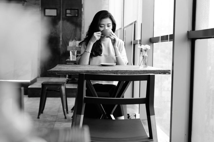 Woman sitting in cafe