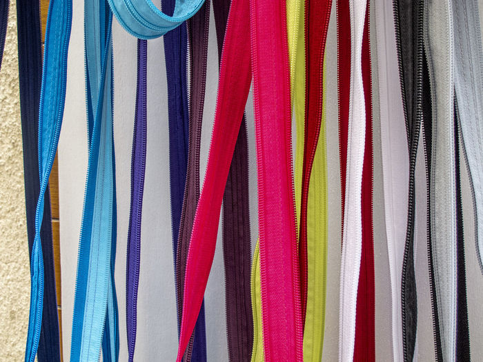 Full frame shot of multi colored umbrellas hanging at market