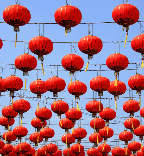 Low angle view of lanterns hanging in row