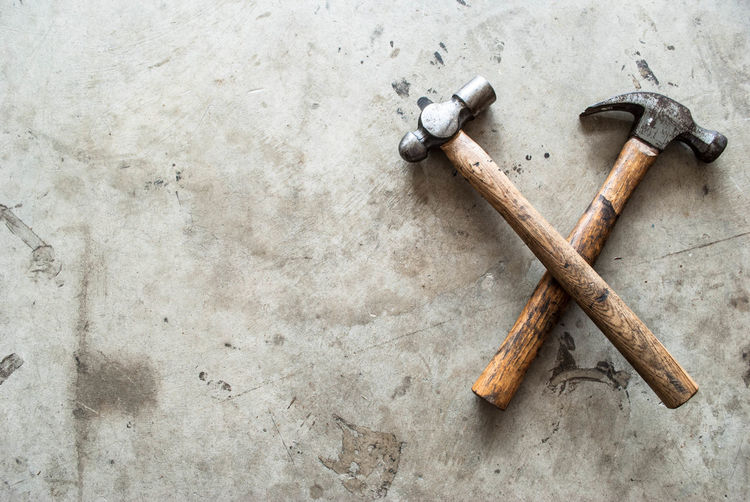 High angle view of hammer on table