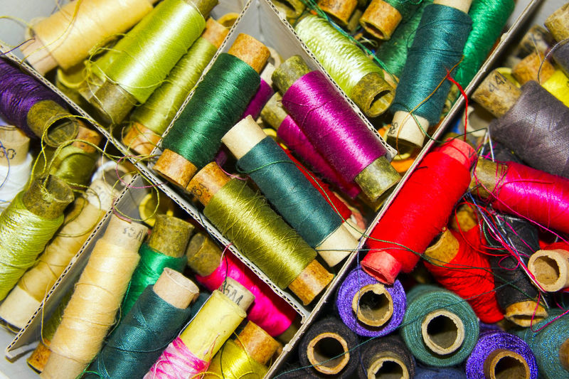 Full frame shot of colorful spools of thread