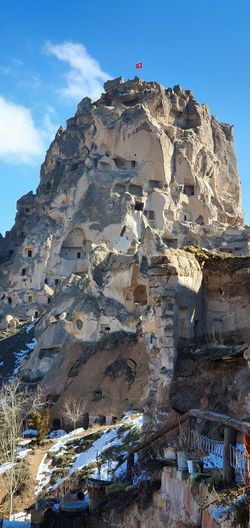 Goreme valley with ancient chapels carved into hillside, cappadocia, turkey