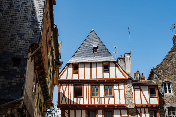 Low angle view of colorful timber-framed medieval house in historic centre of vannes, brittany