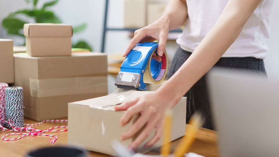 Midsection of man working at home
