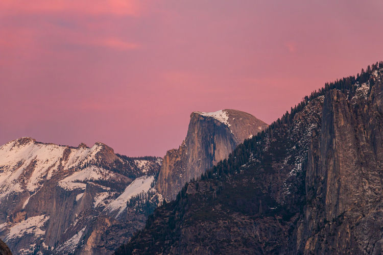 Panoramic view of half dome against sky during sunset.yosemite valley.