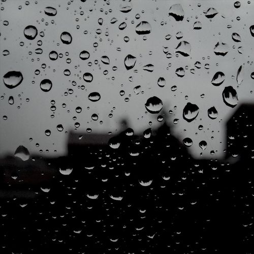 Close-up of water drops on glass