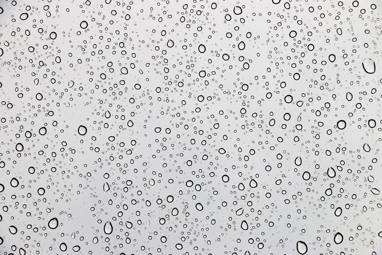 Water drops on glass of rain