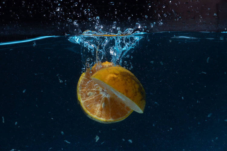High angle view of lemon in water