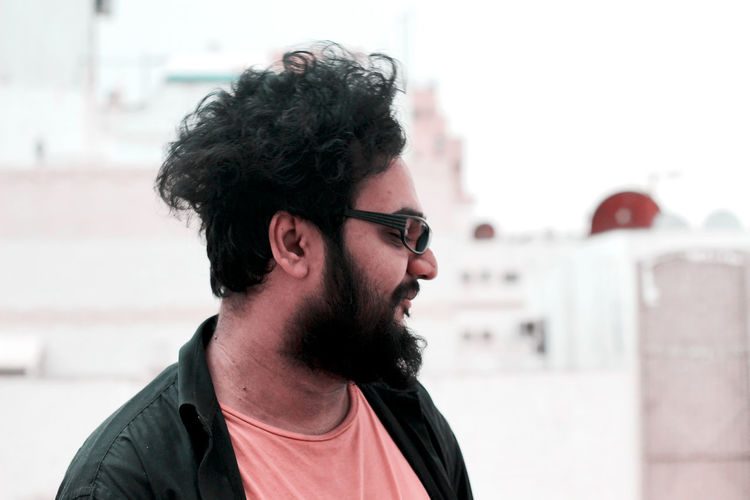 Side view of man looking away