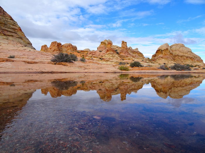 Scenic view of rock formations against sky