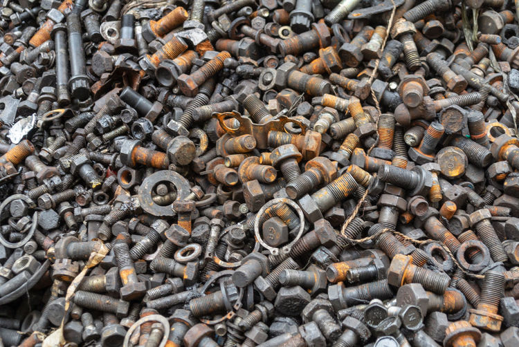 Full frame shot of rusty nuts and bolts