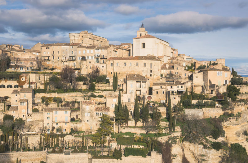 Gordes in provence against cloudy sky