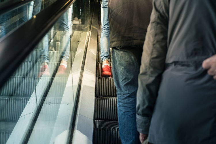 People standing on escalator