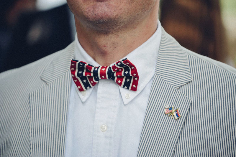 Midsection of man wearing bow tie