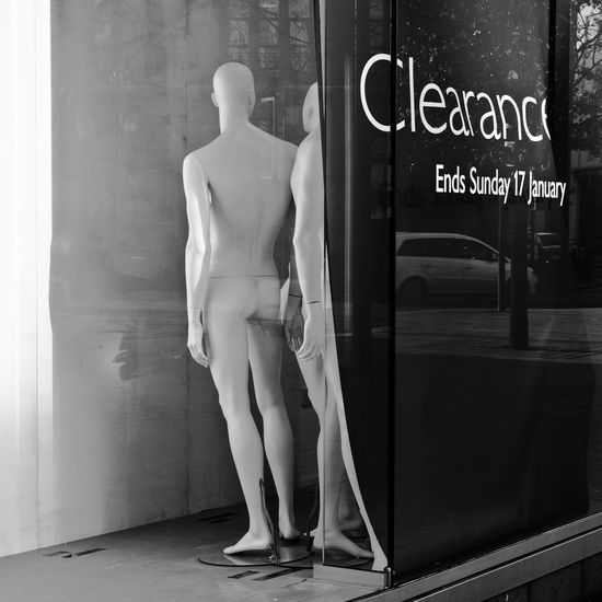 Mannequins displayed in clothing store