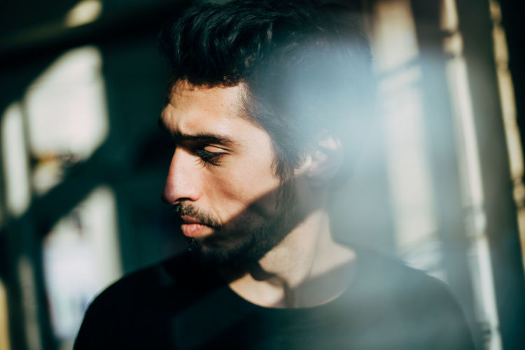 sad and serious looking dark-haired man Crime Jail Loneliness Lonely Prisoner Refugee Victim Arabic Bars Beard Contemplation Facial Hair Focus On Foreground Headshot Lifestyles One Person Portrait Prison Real People Refugees Sad Sadness Serious Young Adult Young Men The Portraitist - 2018 EyeEm Awards