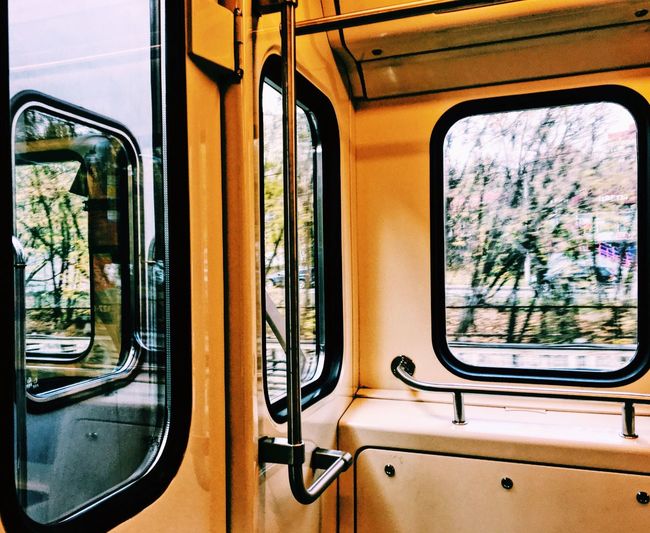 Close-up of yellow train window