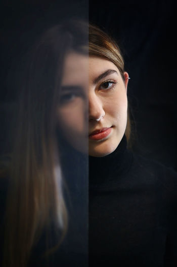 Closeup portrait young woman seen through semi-opaque glass