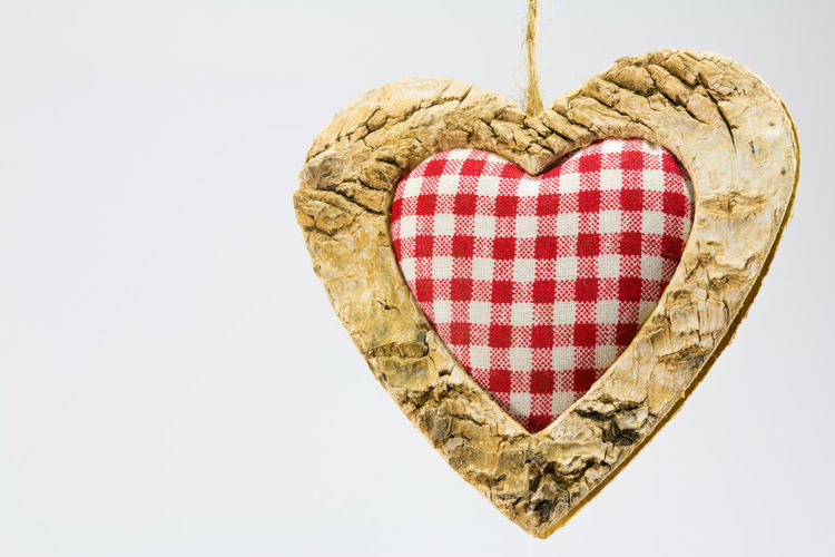 Close-up of heart shape against white background
