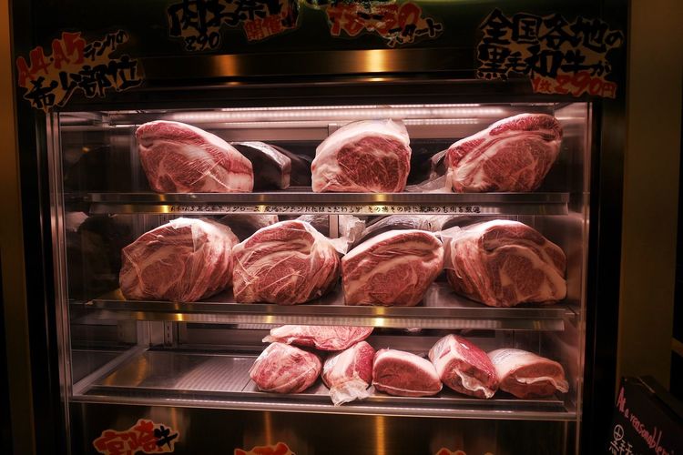 Meat in refrigerator at darkroom