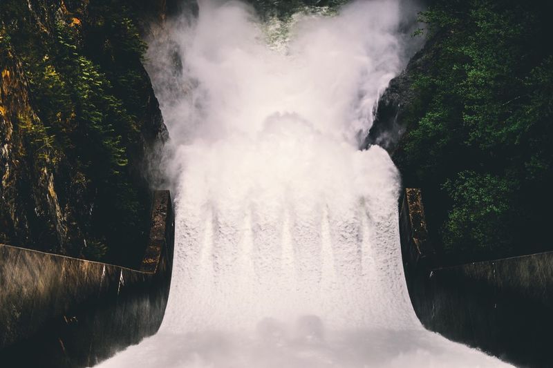 VIEW OF WATERFALL IN RIVER