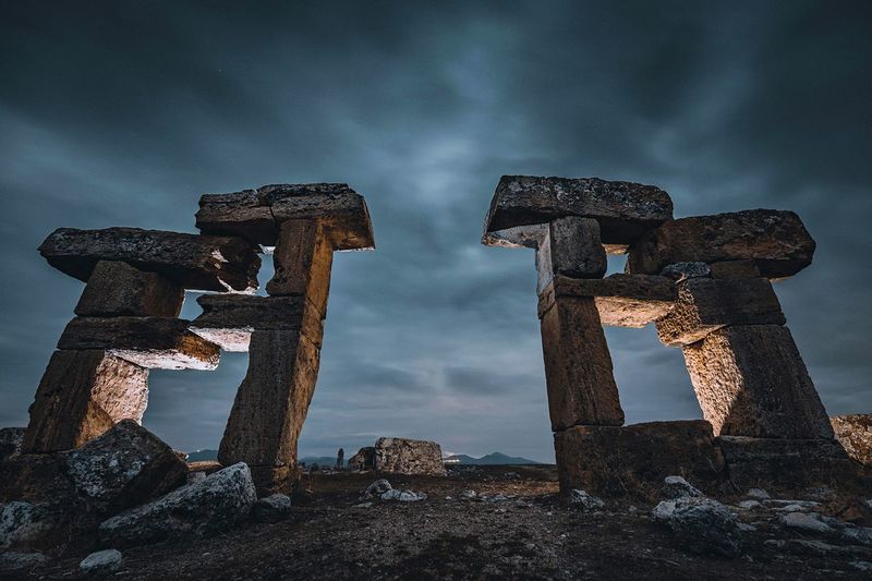 Low angle view of old ruins against sky