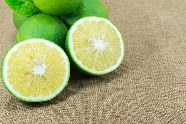 Close-up of lemon slices on table