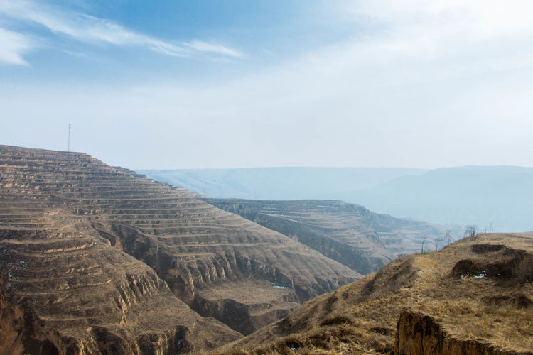 Scenic view of loess plateau against sky
