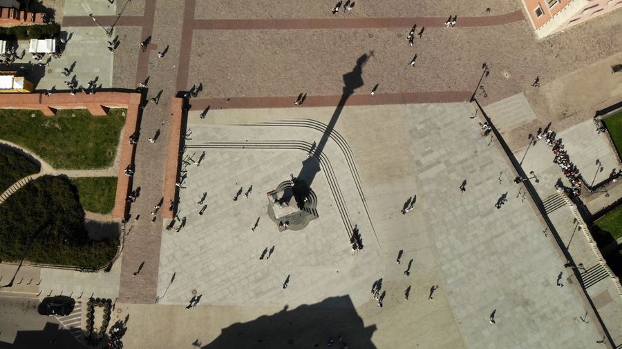 High angle view of people flying in city