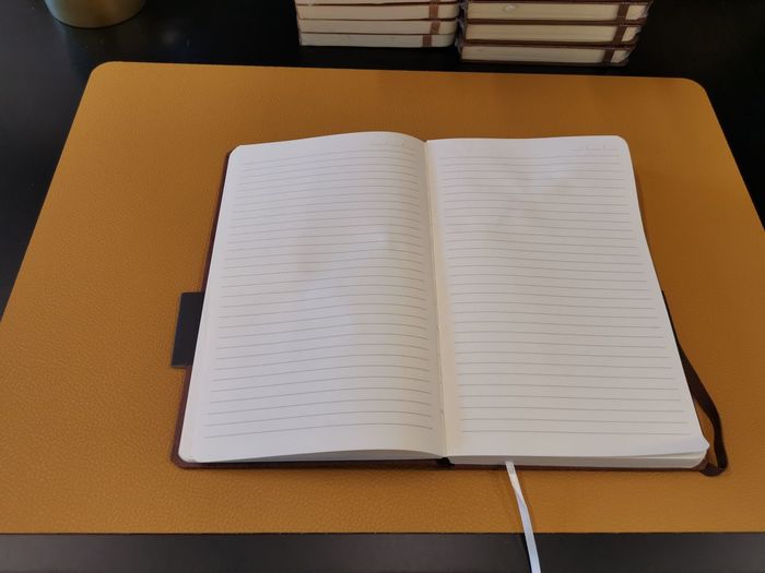 High angle view of open book on table