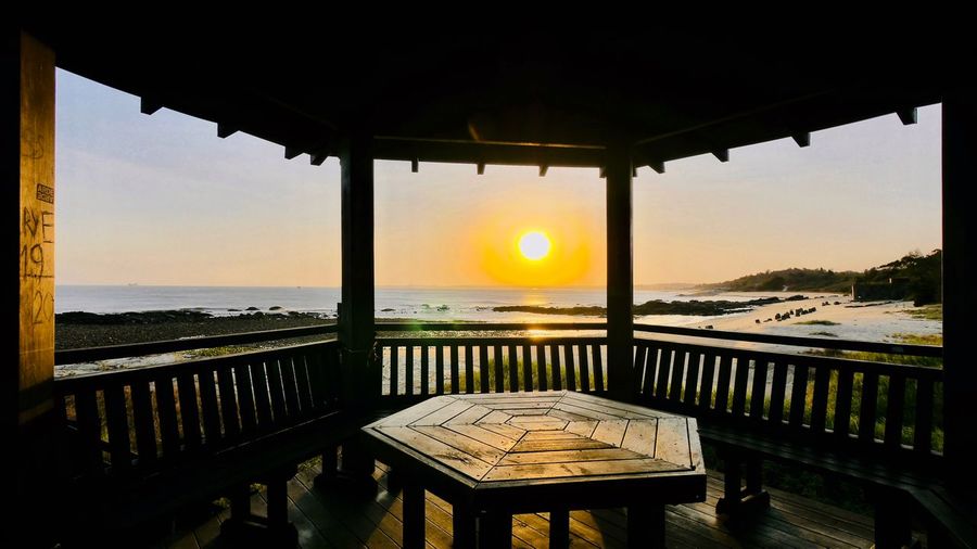 Scenic view of sea against sky during sunset