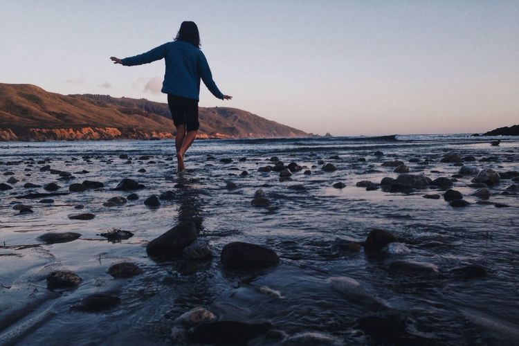 Person walking on beach