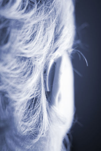 Close-up of woman with hearing aid