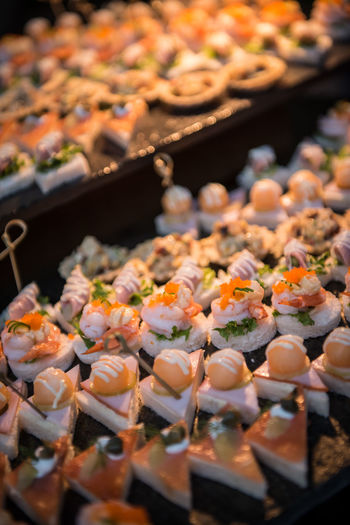 High angle view of sushi for sale in market