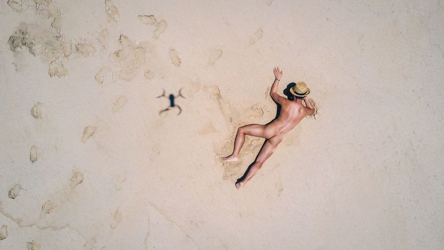 Always watching you 👁👁 Summer Sand One Person Human Body Part Beach Vacations Adult Outdoors Adults Only Model Rear View Drone Dronephotography Dji DJI Mavic Pro Self Portrait Selfie ✌ Nude_model Live For The Story BYOPaper! Vertical Shot Human Back Lost In The Landscape Perspectives On Nature