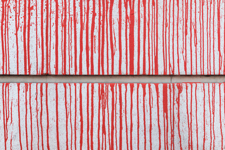 Full frame shot of red paint on wall
