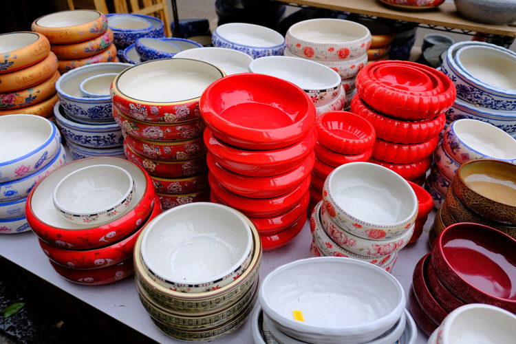 High angle view of various containers on table