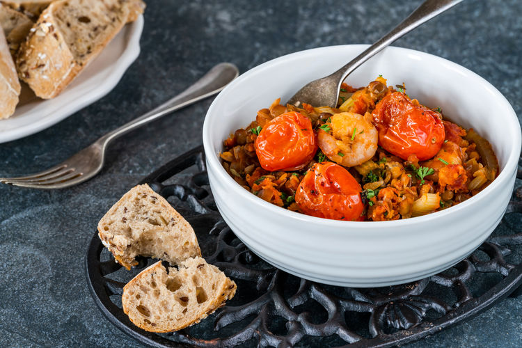 Chorizo, lentil and prawn stew with roasted tomatoes