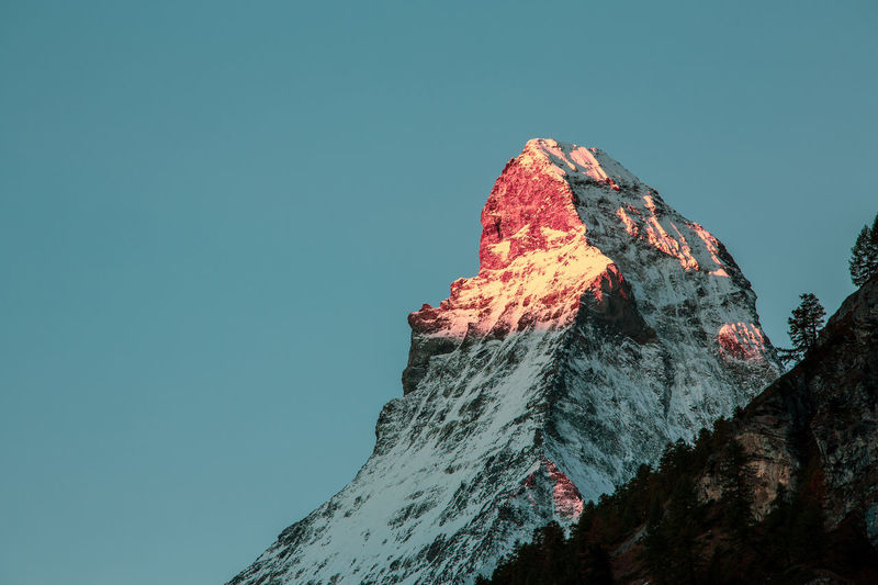 Mountain glow, matterhorn peak illuminated by the morning sun.