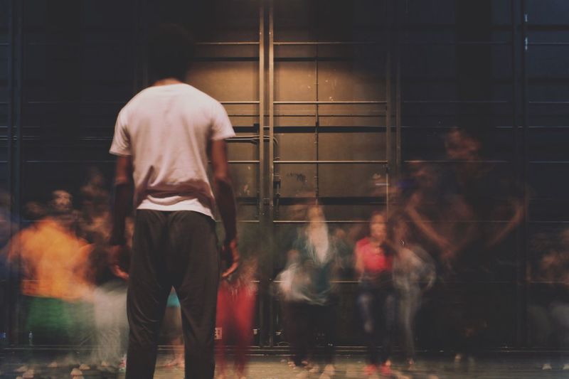 Rear view of man  at dance workshop