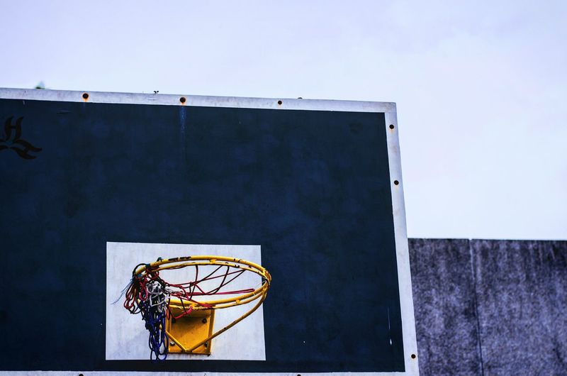 Close-up of basketball hoop against clear sky